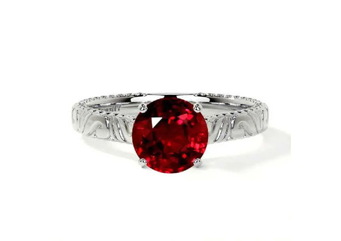 Garnet Solitaire Engagement Ring: A Timeless Setting