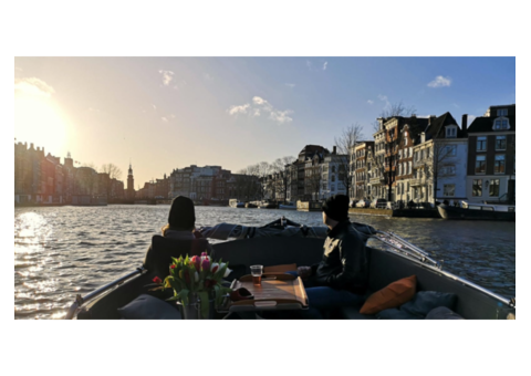 Discover the Magic of Amsterdam: Evening Cruise with Boat Local