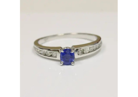 Chic Blue Sapphire Prong Set Ring Featuring Dazzling Round Diamonds