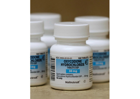 Bottles of prescription painkillers Oxycodone Hydrochloride,