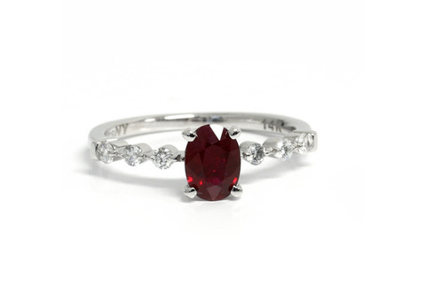 Oval Cut Ruby Prong Set Ring With Round Diamonds (0.98cttw)