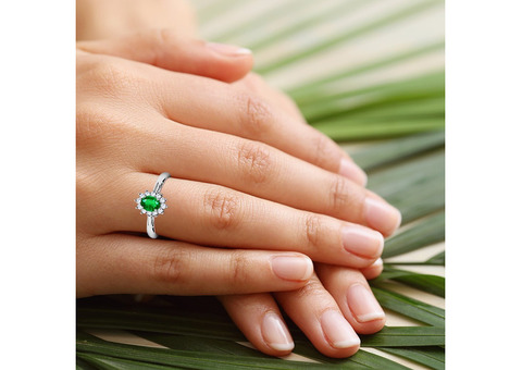 Our Womens Emerald Rings with Oval Cut and Princess Diana Halo Design!